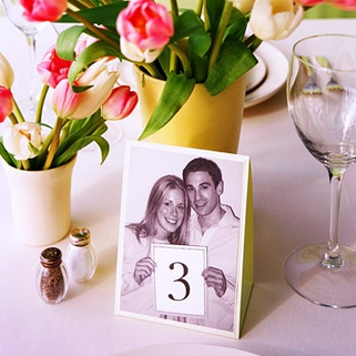 add a personal touch with diy photo table numbers that will take the guests down memory lane from #MarthaWeddings #PreppyPlanner