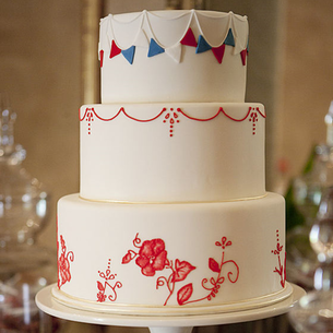 Red, White & Blue Wedding: Elegant wedding cake with decorative colored icing #PreppyPlanner