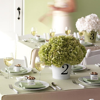 use vinyl decals on pots or pails to create your table numbered centerpiece #MarthaWeddings #PreppyPlanner