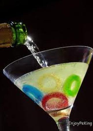 Olympic themed signature drink using candy lifesavers and champagne #PreppyPlanner